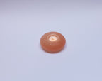 Lampade e portacandele in sale rosa di Potohar