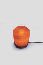 Lampade e portacandele in sale rosa di Potohar