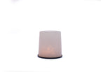 Lampade e portacandele in sale rosa di Potohar